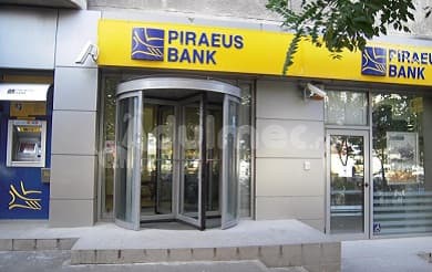 Piraeus Bank şterge datorii de până la 20.000 de euro pentru clienţii din Grecia afectaţi de criză
