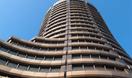 Банк международных расчетов призвал банки отказаться от экстренных мер поддержки экономики